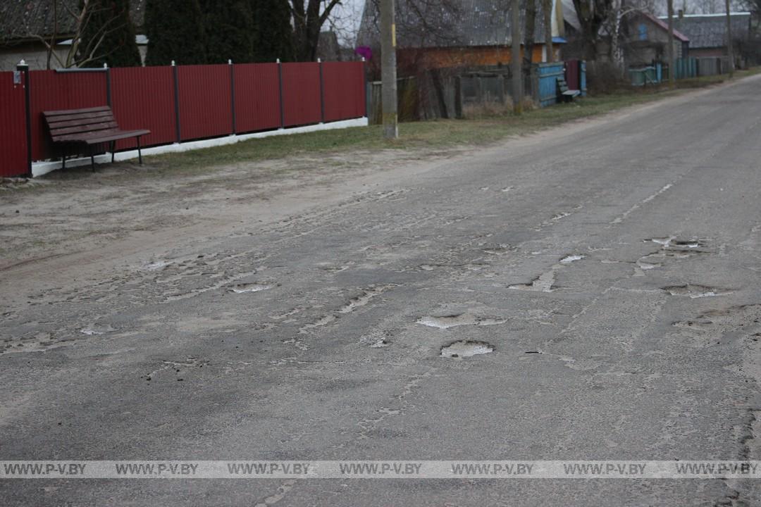 Горы песка разровняли, обещали выполнить ямочный ремонт